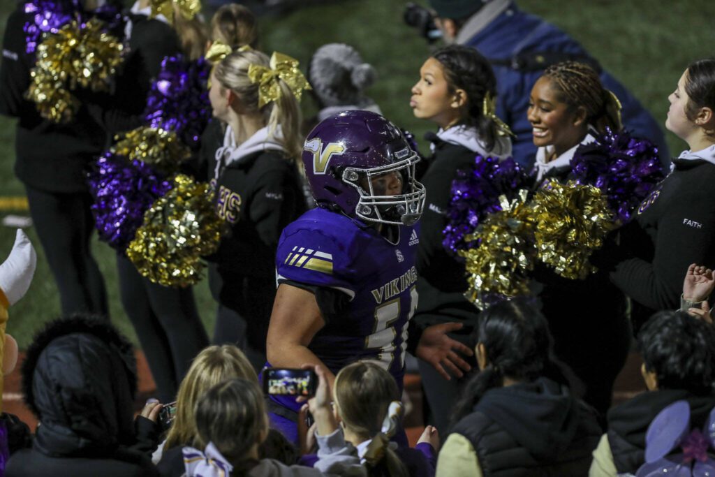 Lake Stevens players and fans celebrate during a game between Lake Stevens and Kennedy Catholic at Lake Stevens High School in Lake Stevens, Washington on Friday, Nov. 17, 2023. Lake Stevens won, 44-21. (Annie Barker / The Herald)
