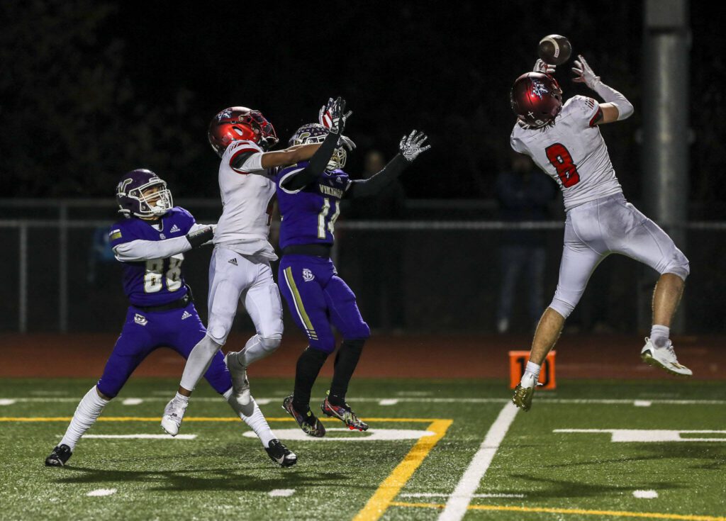 Kennedy Catholic’s Dante Saladino (8) intercepts the ball during a game between Lake Stevens and Kennedy Catholic at Lake Stevens High School in Lake Stevens, Washington on Friday, Nov. 17, 2023. Lake Stevens won, 44-21. (Annie Barker / The Herald)
