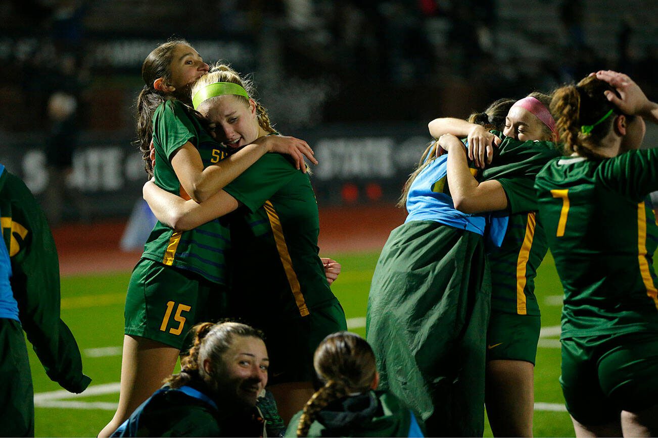 Shorecrest players celebrate their victory against Lakeside during the WIAA 3A Girls Soccer Semifinal on Friday, Nov. 17, 2023, at Carl Sparks Stadium in Puyallup, Washington. (Ryan Berry / The Herald)