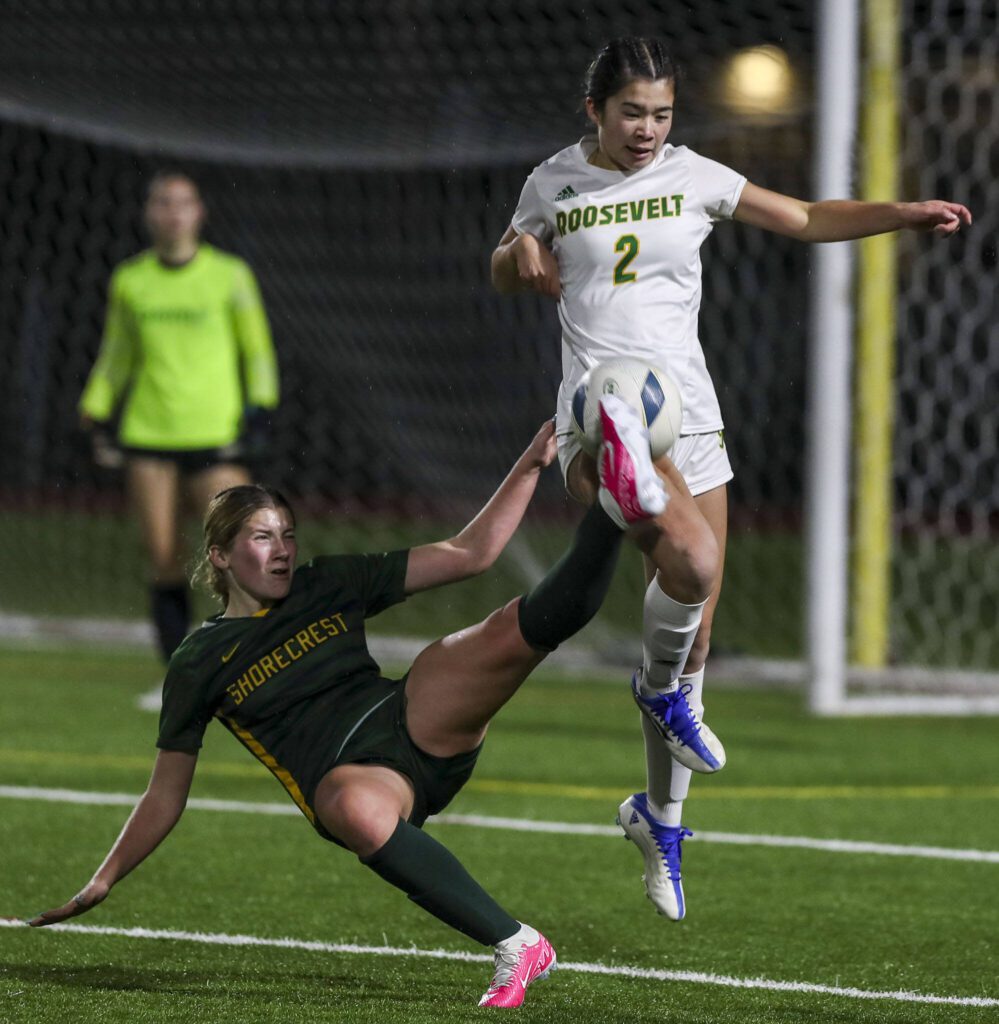 Players fight for the ball during the Shorecrest and Roosevelt Class 3A girls soccer state championship game at Sparks Stadium in Puyallup, Washington on Saturday, Nov. 18, 2023. Shorecrest lost, 4-1. (Annie Barker / The Herald)
