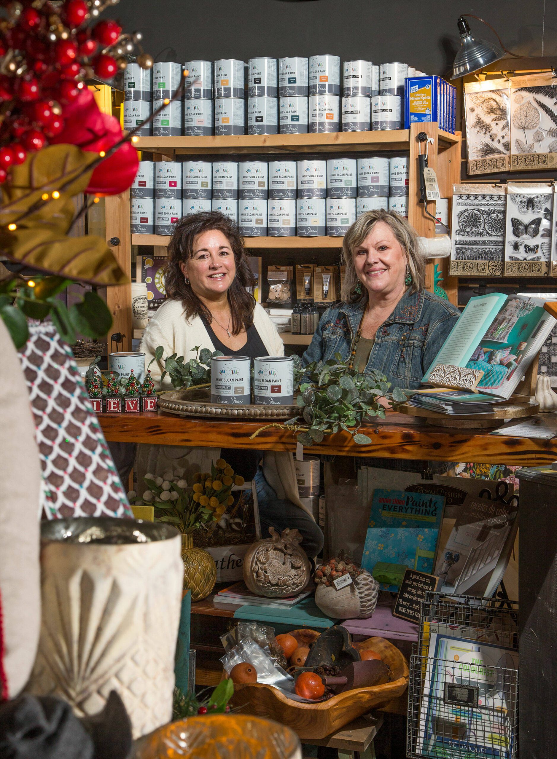 Owners of Country Rose/The Paint Bungalow, Donna Mains (left) and Kathleen Shalan in the shop on Wednesday, Oct. 27, 2021 in Arlington, Washington. The gift store also stocks Annie Sloan paint as well as being a women's apparel boutique. (Andy Bronson / The Herald)