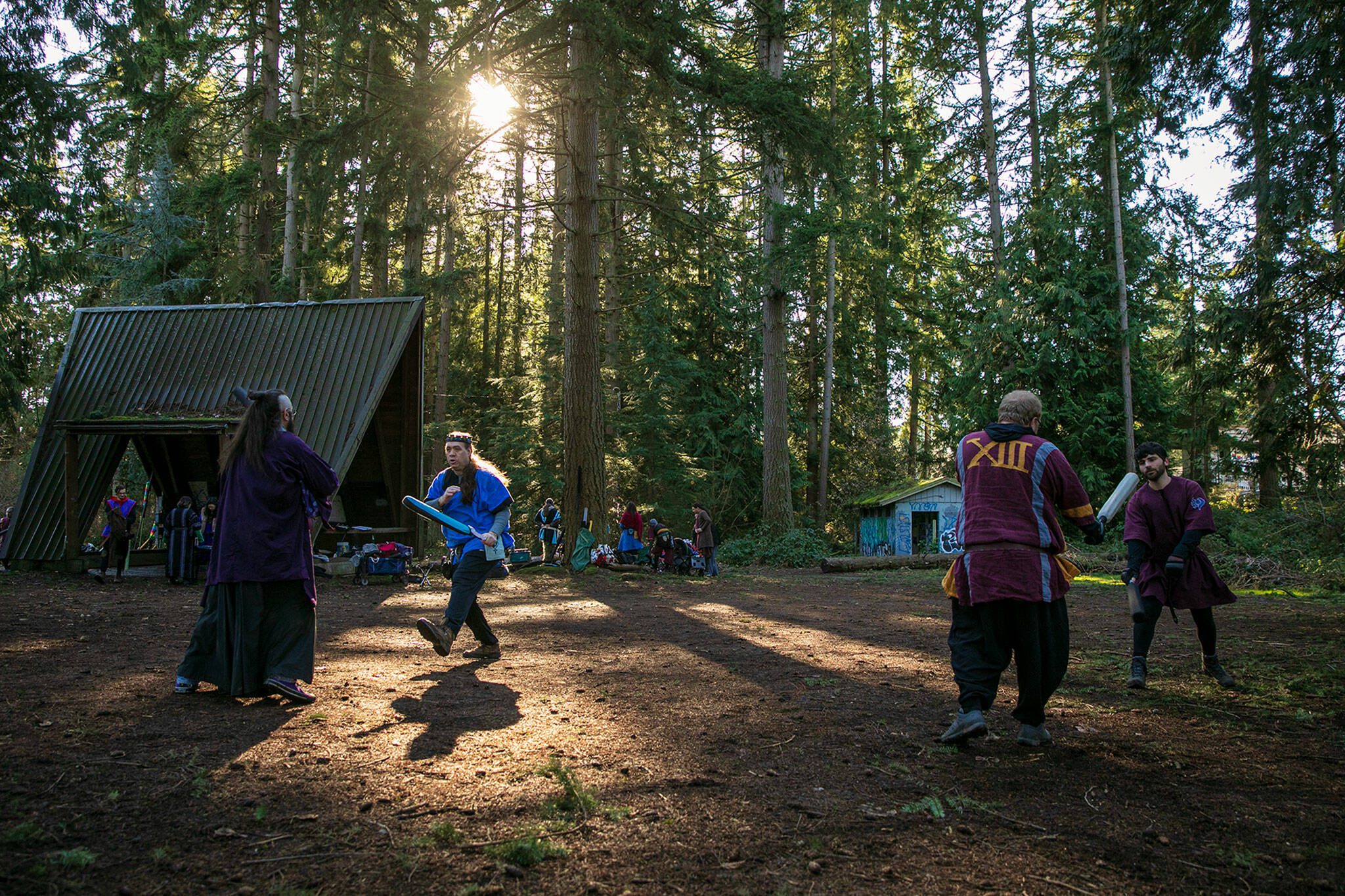 Players ditch — a type of sparring — during a weekly meeting of the Amtgard LARPing group The Hollow on Jan. 29, at McCollum Park. (Ryan Berry / The Herald)