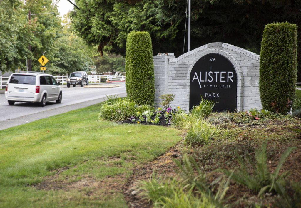 Cars drive past Alister Parx apartments on Thursday, Sept. 28, 2023 in Everett, Washington. (Olivia Vanni / The Herald)

