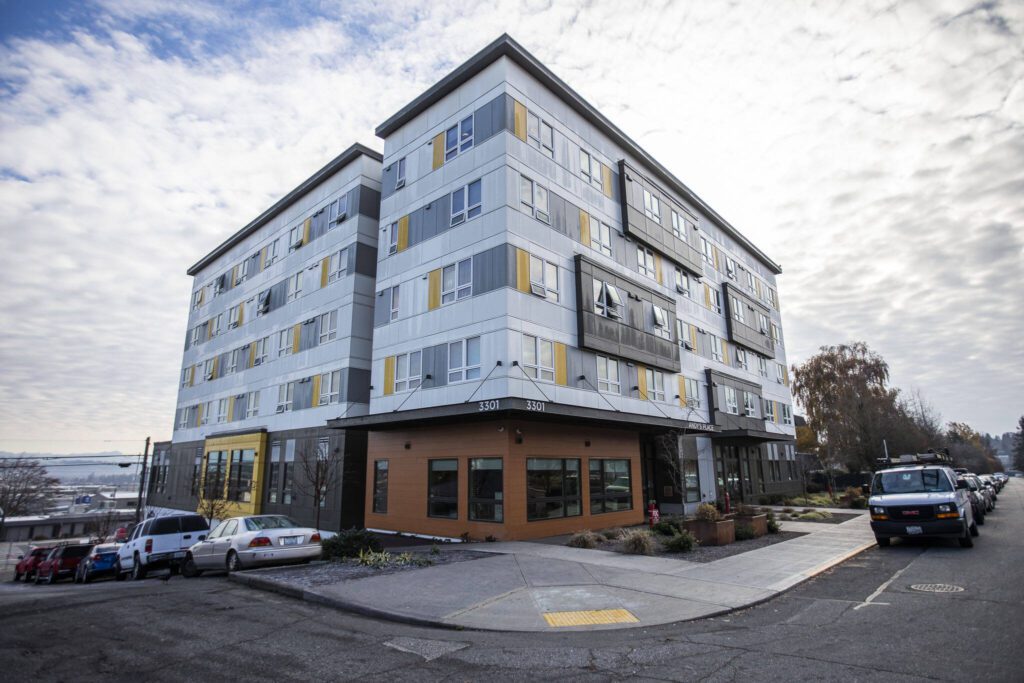 Outside of Compass Health’s Andy’s Place residence next to the Broadway construction site of Compass Health’s new mental health facility on Wednesday, Nov. 29, 2023 in Everett, Washington. (Olivia Vanni / The Herald)
