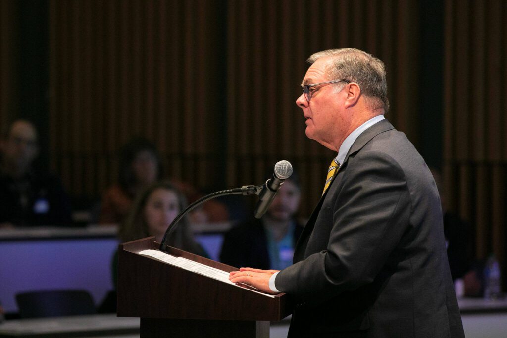 Washington Lieutenant Governor Danny Heck delivers a keynote speech during the Building Bridges Summit on Monday, Dec. 4, 2023, at Washington State University Everett in Everett, Washington. (Ryan Berry / The Herald)
