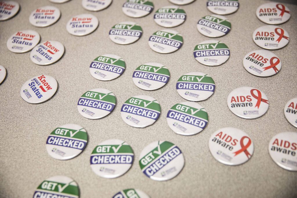 Buttons with STI related slogans at a press conference held in celebration of the STI clinic opening on Friday, Dec. 1, 2023 in Everett, Washington. (Olivia Vanni / The Herald)
