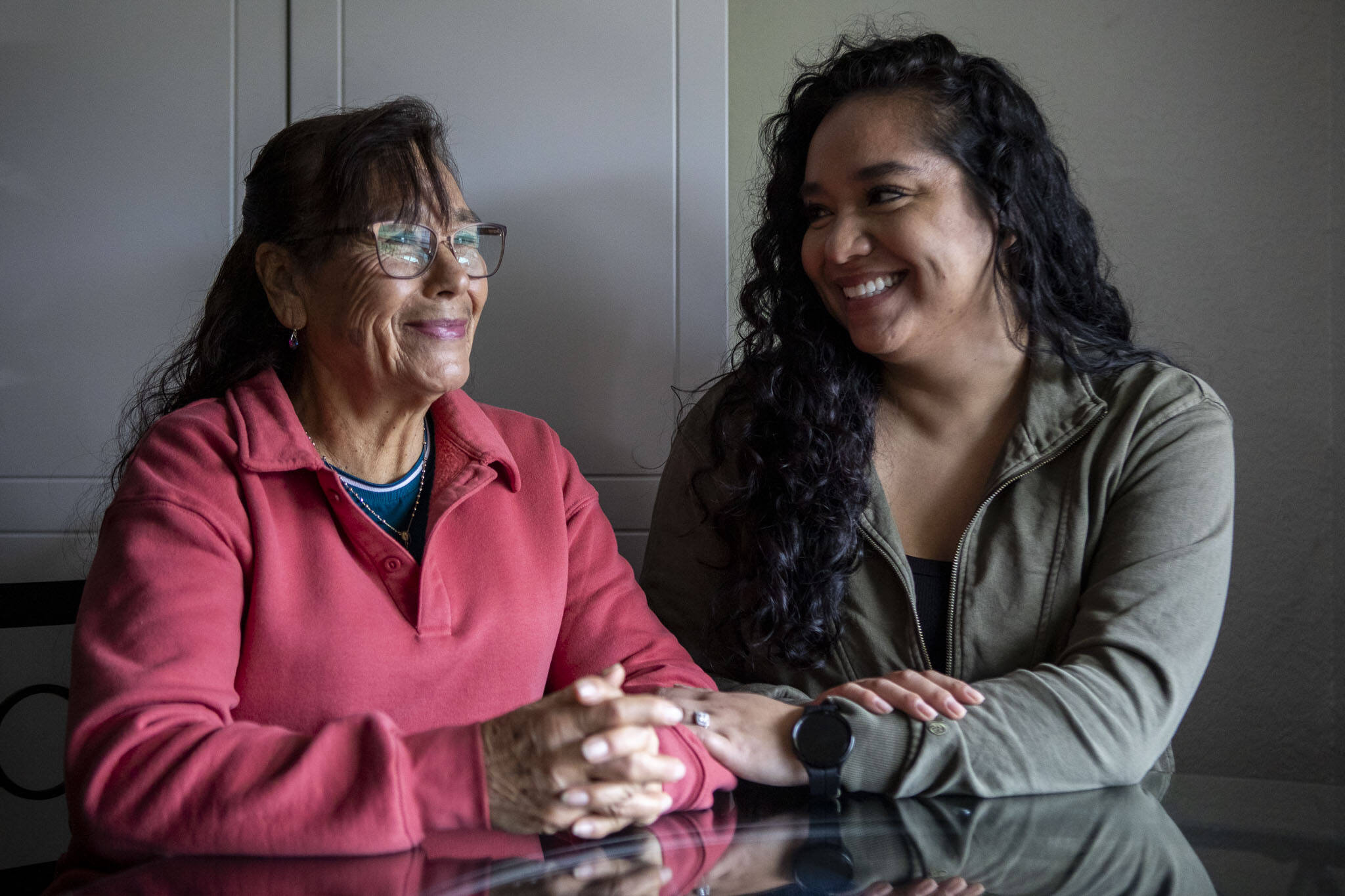 Elizabeth Cervantes, right, and her mother Maria Jimenez, left, pose for a photo at their home in Burlington, Washington on Wednesday, Dec. 6, 2023.  (Annie Barker / The Herald)