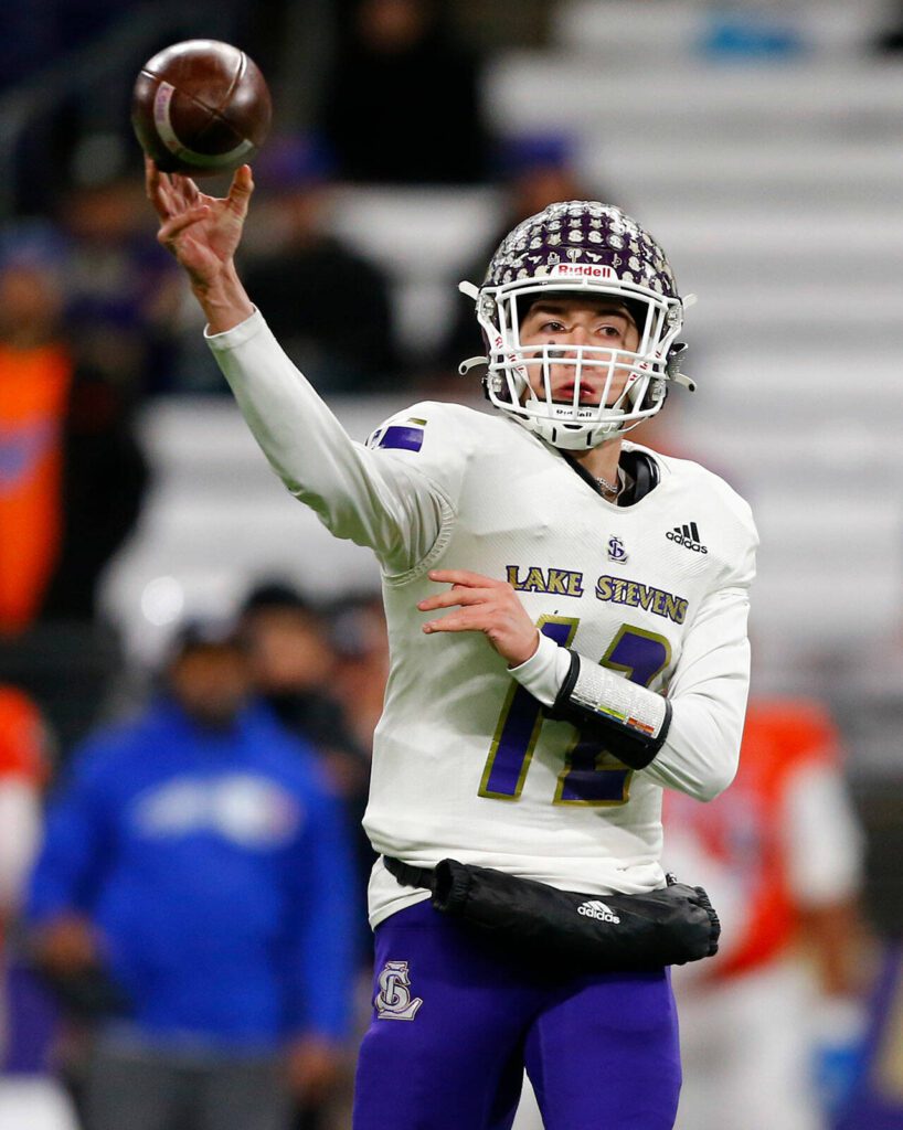 Lake Stevens’ Kolton Matson completes a short pass against Graham-Kapowsin during the WIAA 4A Football State Championship on Saturday, Dec. 2, 2023, at Husky Stadium in Seattle, Washington. (Ryan Berry / The Herald)
