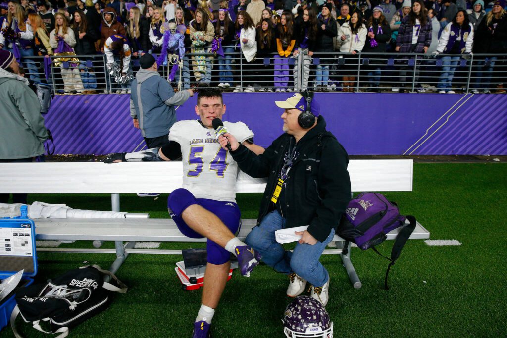 Lake Stevens senior Mason Turner is interviewed by Steve Willits after the Vikings’ win over Graham-Kapowsin in the WIAA 4A Football State Championship on Saturday, Dec. 2, 2023, at Husky Stadium in Seattle, Washington. (Ryan Berry / The Herald)
