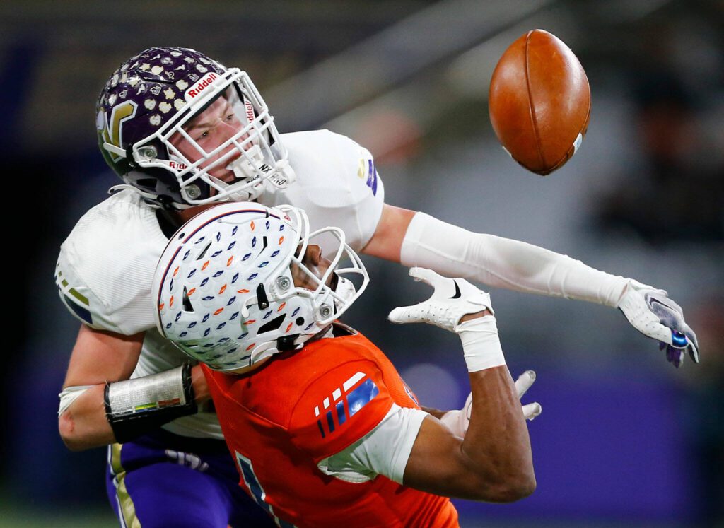 Lake Stevens’ Jesse Lewis bats away a long pass attempt while in coverage against Graham-Kapowsin during the WIAA 4A Football State Championship on Saturday, Dec. 2, 2023, at Husky Stadium in Seattle, Washington. (Ryan Berry / The Herald)
