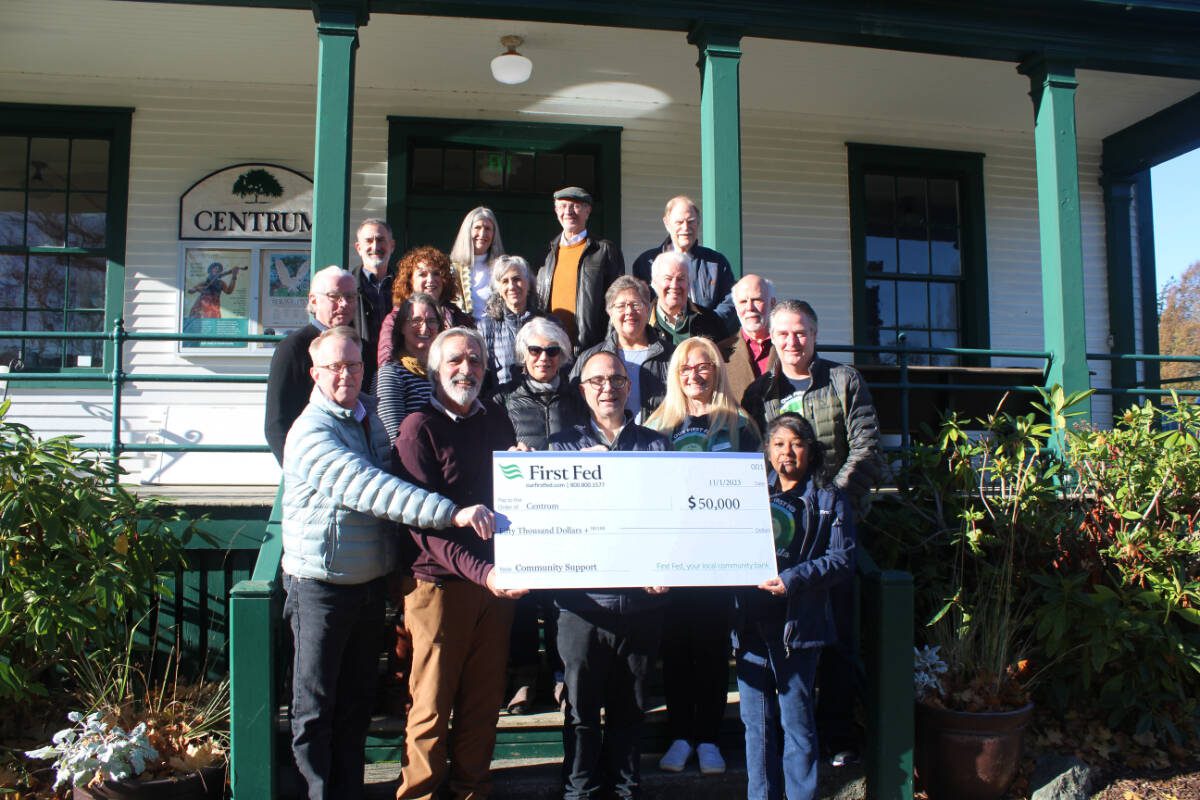 First Fed presents a generous charitable donation to the Board and Staff at Centrum in honor of the arts non-profit’s 50th anniversary in Port Townsend. Pictured (front row L-R) Centrum Executive Director Robert Birman, Centrum Board Chair Scott Wilson, First Fed Board Member Norm Tonina, First Fed Port Townsend Branch Manager Luxmi Love; 2nd Row: Walter Parsons, Katy Goodman, Catharine Robinson, Sara Spalding, John Murock; 3rd Row: Kris Easterday, Renee Klein, Leah Mitchell, Robert Alexander, Sam Shoen; 4th Row David Rinn, Jeanie Cardon, Andy Fallat, Malcolm Harris.