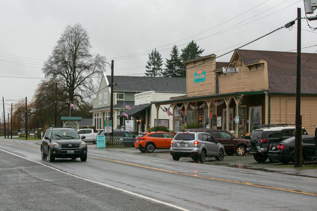 It’s business as usual along Pioneer Highway on Thursday, Dec. 7, 2023, after extensive flooding from the Stillaguamish River in Silvana, Washington. (Ryan Berry / The Herald)
