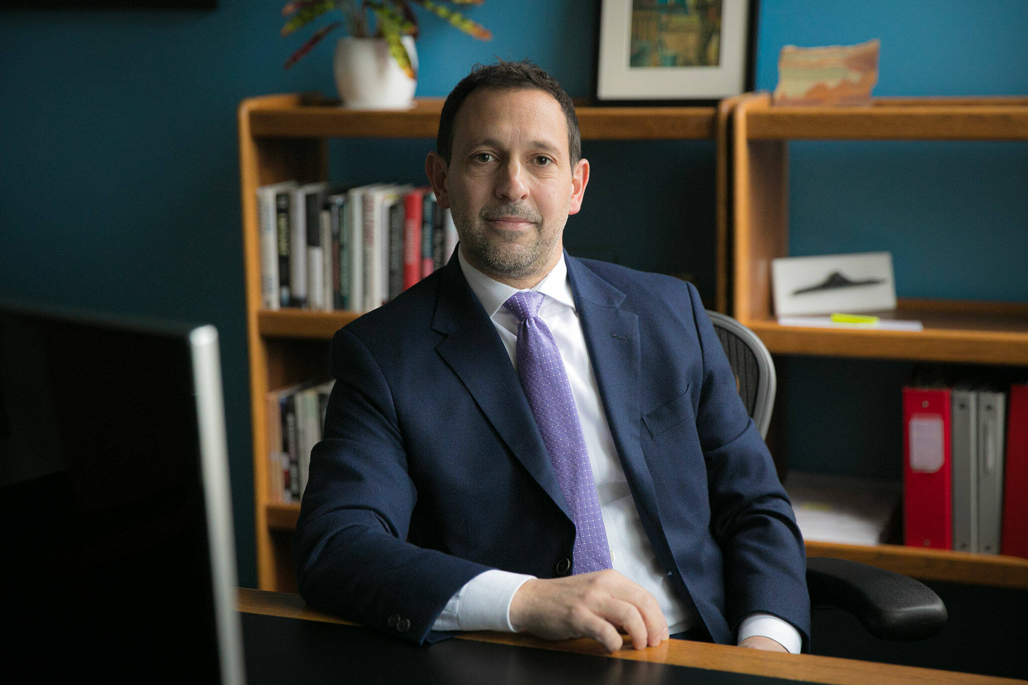 Director of the Office of Public Defense Jason Schwarz in his office at the Snohomish County Superior Courthouse. (Ryan Berry / The Herald)