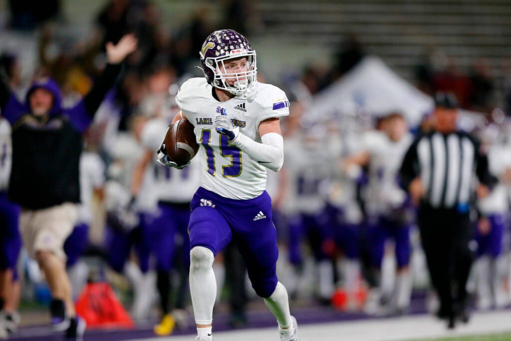 Lake Stevens senior Jesse Lewis coasts into the end zone for a touchdown on a long catch-and-run against Graham-Kapowsin during the Class 4A state championship game Dec. 2 at Husky Stadium in Seattle. (Ryan Berry / The Herald)
