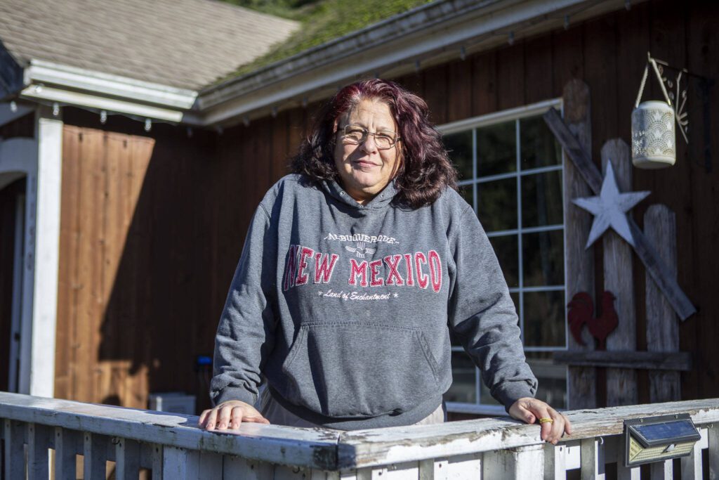Tarya Palmer poses for a photo at her home in Darrington, Washington on Tuesday, Dec. 12, 2023. (Annie Barker / The Herald)
