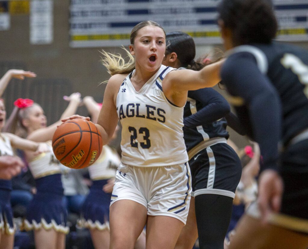 Arlington’s Jersey Walker yells out a play during the game against Lynnwood on Monday, Dec. 11, 2023 in Arlington, Washington. (Olivia Vanni / The Herald)
