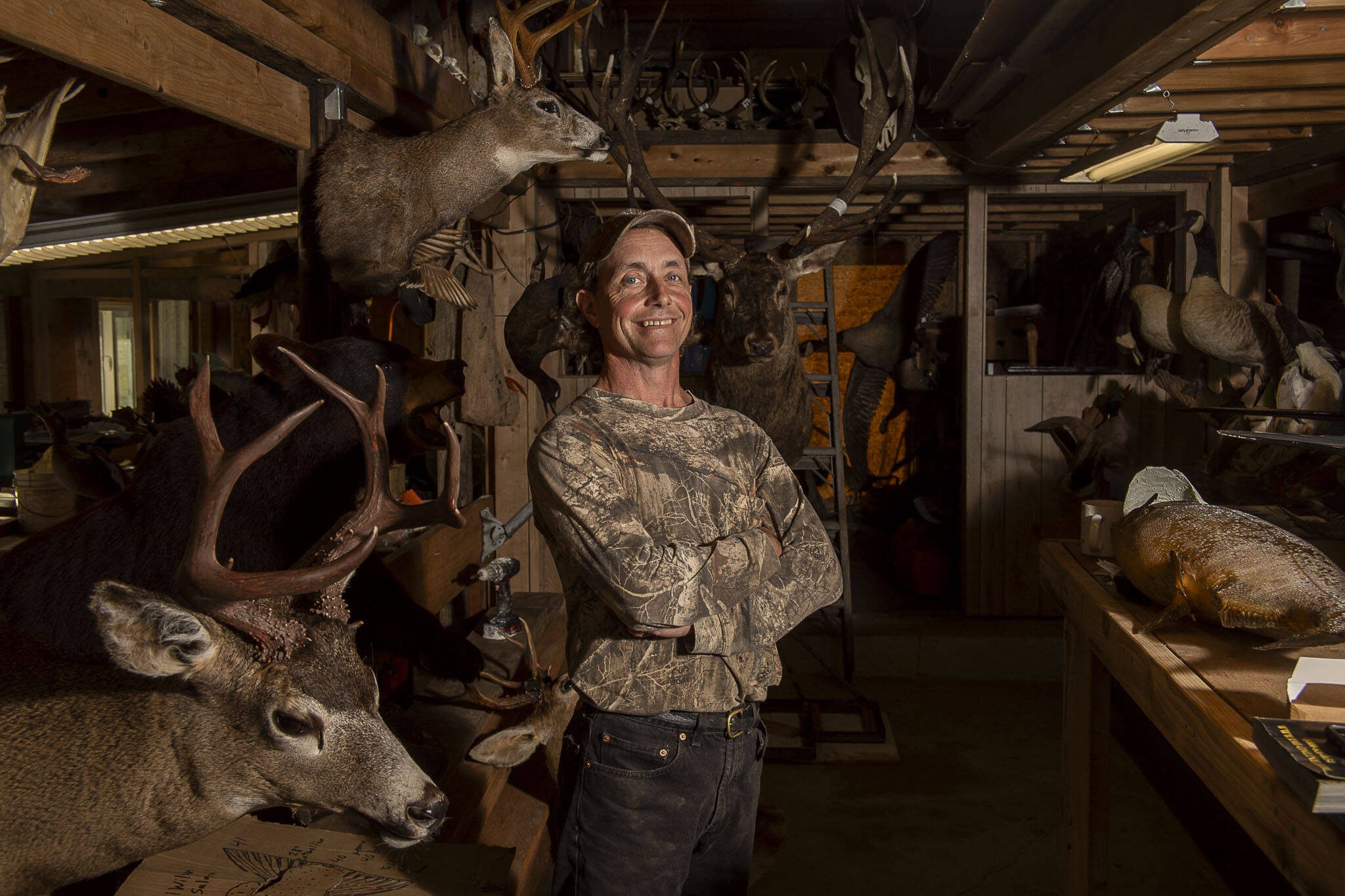 Steve Moro, 52, poses for a photo at his business workspace for Anitomical Creation/Woods Creek Taxidermy in Snohomish, Washington on Thursday, Oct. 12, 2023. (Annie Barker / The Herald)