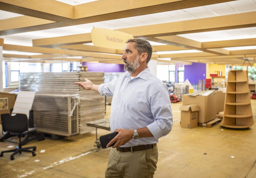 Assistant Director of Facilities R.D. Burley talks about the damage sustained from the burst pipe on Friday, July 15, 2022 in Edmonds, Washington. (Olivia Vanni / The Herald)
