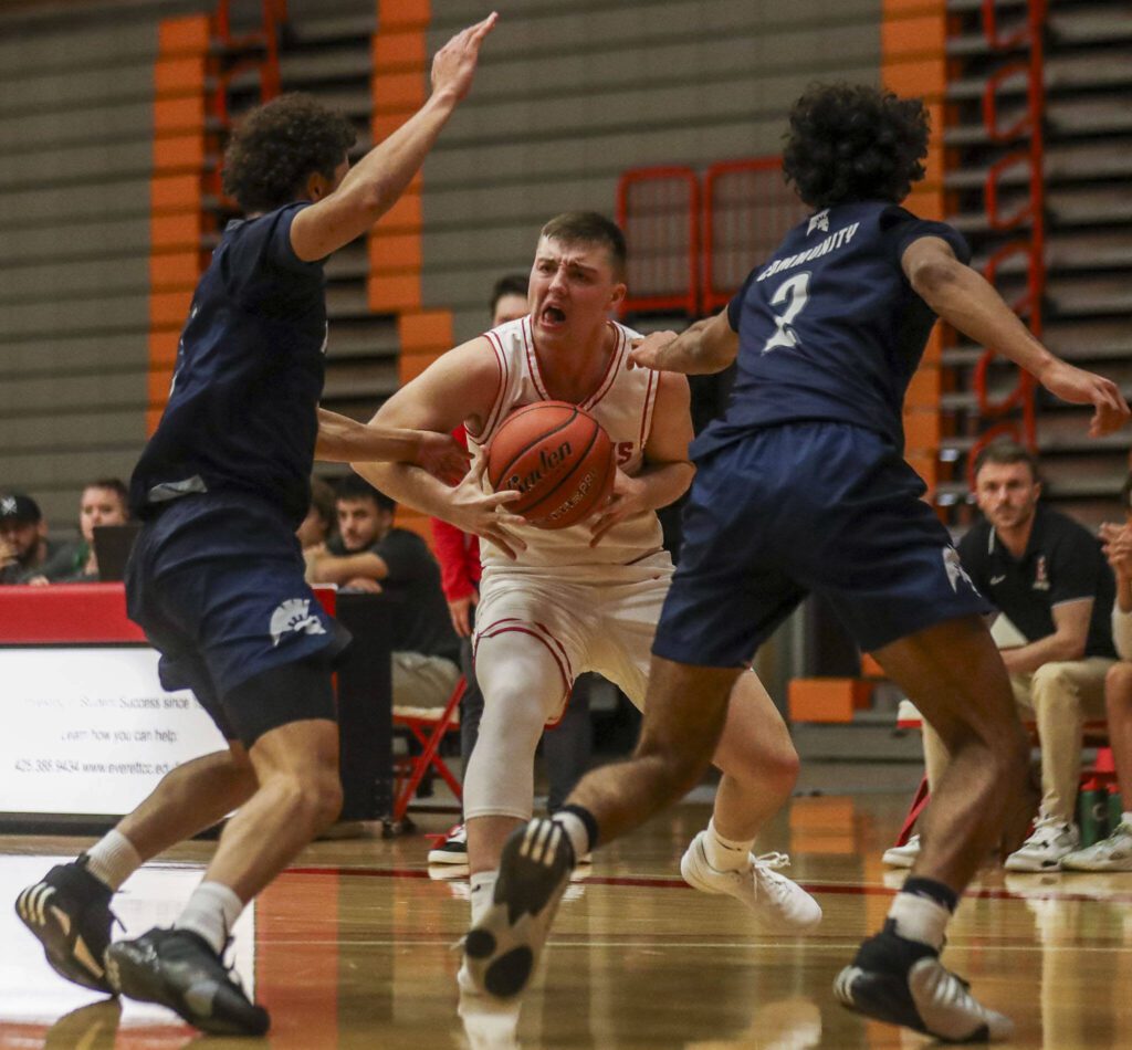 Everett Community College’s Ethan Martin (1) moves with the ball during a game against Tacoma on Dec. 9 at Everett Community College in Everett. (Annie Barker / The Herald)
