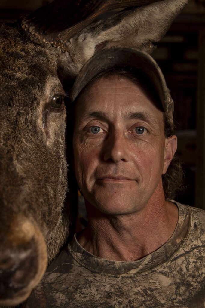 Steve Moro, 52, poses for a photo at his workspace for Woods Creek Taxidermy on Thursday, Oct. 12, 2023, in Snohomish, Washington. (Annie Barker / The Herald)
