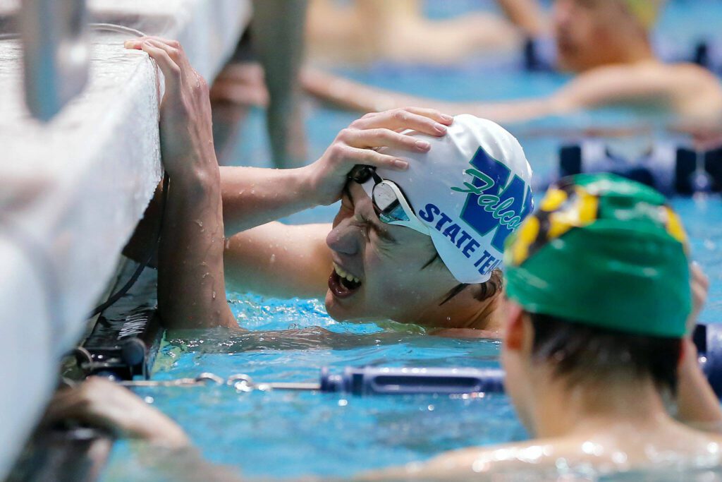 Woodinville senior Levi Major shouts about missing a time by 0.01 seconds after finishing the 100-yard freestyle consolation race at the 4A WIAA Boys High School Swim and Dive Championships on Friday, Feb. 18, 2023, at the Weyerhaeuser King County Aquatic Center in Federal Way, Washington. (Ryan Berry / The Herald)
