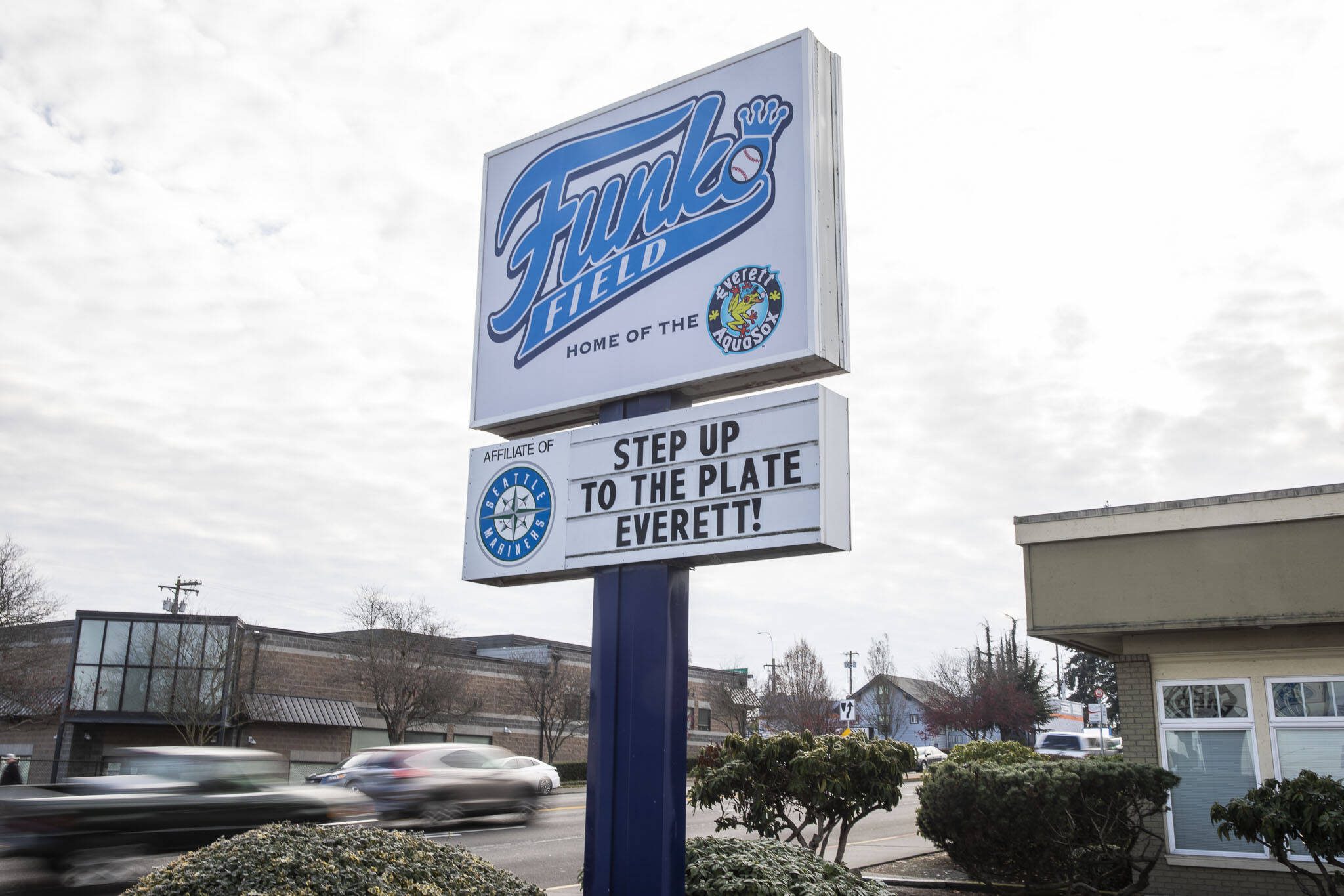 A sign in front of the AquaSox front office references the upcoming Everett City Council vote on a sum of $1.1 million to give to outside contractors to help upgrade a new stadium on Wednesday, Nov. 29, 2023 in Everett, Washington. (Olivia Vanni / The Herald)