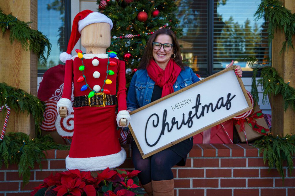 Katie Grindon of KG Realty dressed up her peg person as Santa Claus. (Photo by David Welton)
