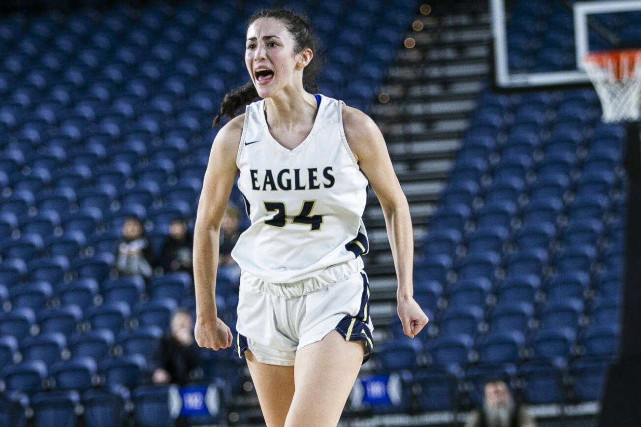 Arlington’s Jenna Villa reacts to a teammate drawing a foul call during the 3A quarterfinal game against Meadowdale on Thursday, March 2, 2023 in Tacoma, Washington. (Olivia Vanni / The Herald)