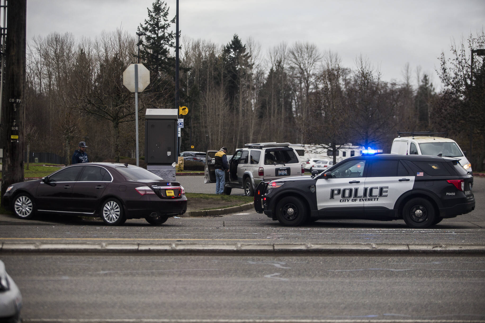 Everett Police respond to an accident along Highway 99 just north of Airport Road on Tuesday, Dec. 21, 2021 in Everett, Wa. (Olivia Vanni / The Herald)