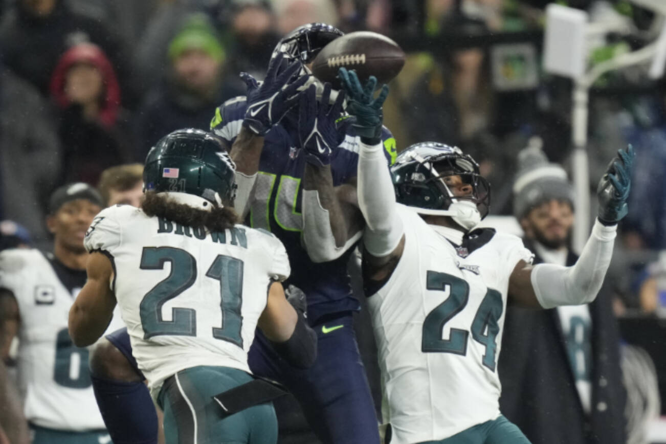 Seattle Seahawks wide receiver DK Metcalf (14) catches the ball during an NFL football game against the Philadelphia Eagles, Monday, December 18, 2023 in Seattle. The Seahawks won 20-17. (AP Photo/Ben VanHouten)