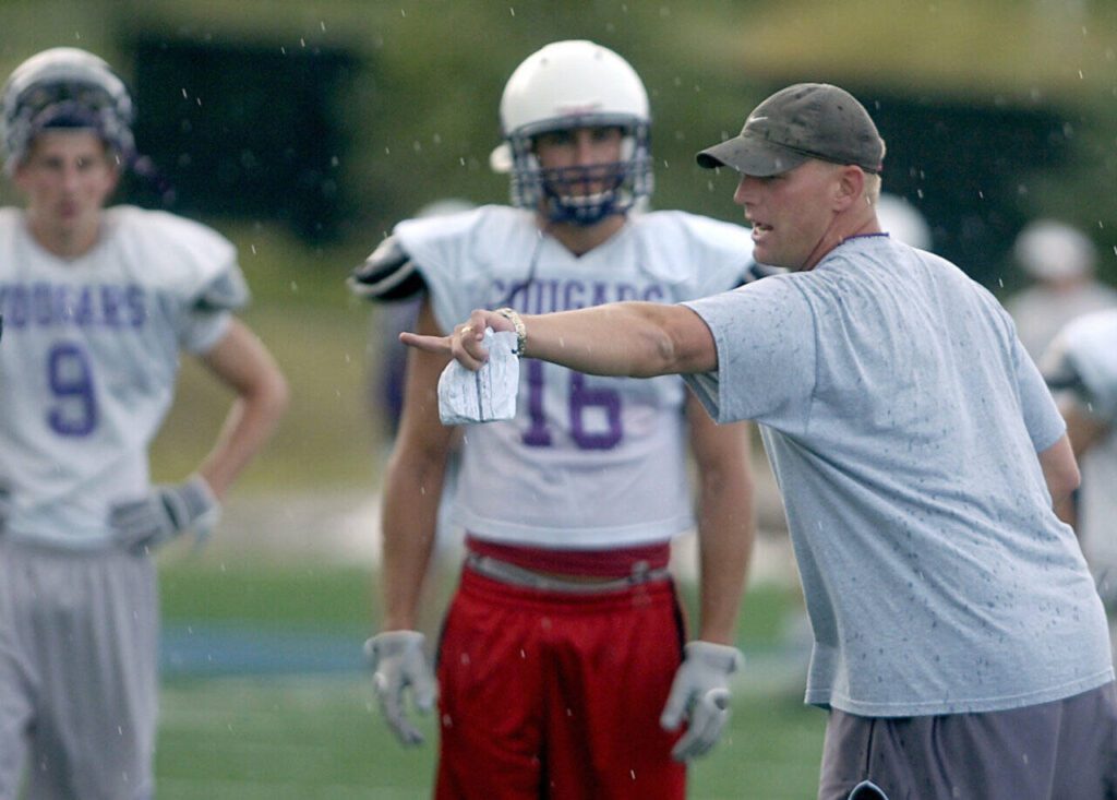 Kalen DeBoer leads practice at the University of Sioux Falls in Sioux Falls, South Dakota, on Aug. 19, 2009. (Elisha Page / The Argus Leader via Associated Press)
