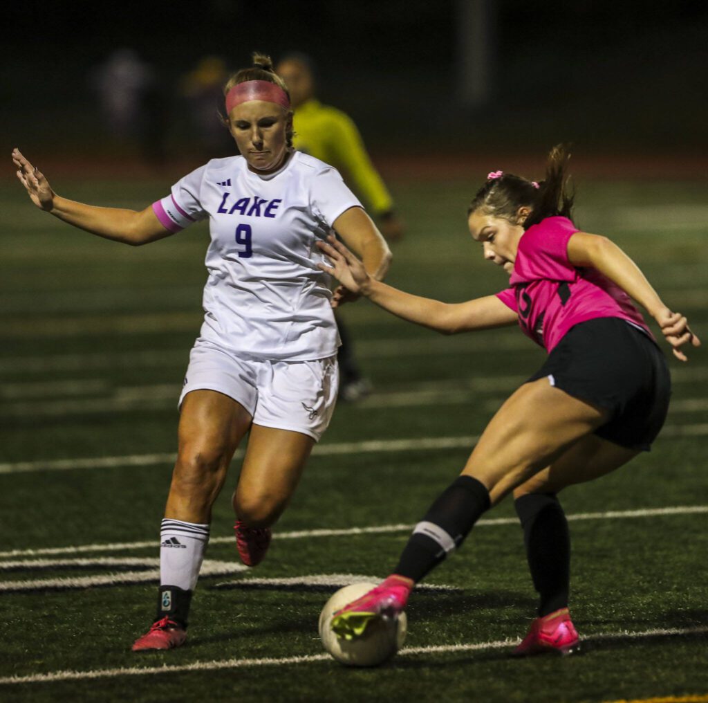 Kamiak’s Taylor Beirne (right) (Annie Barker / The Herald)
