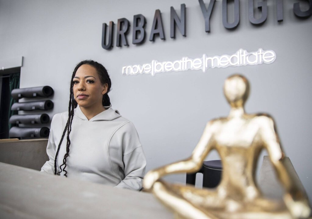 Owner of Urban Yogi Kiana Njie at her business on Friday, Jan. 5, 2024 in Everett, Washington. (Olivia Vanni / The Herald)
