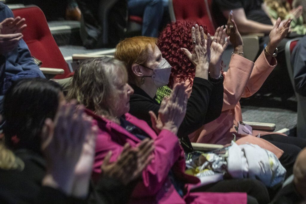 Attendees applaud during the ceremonial oath of office at the PUD auditorium in Everett, Washington on Tuesday, Jan. 2, 2024. (Annie Barker / The Herald)
