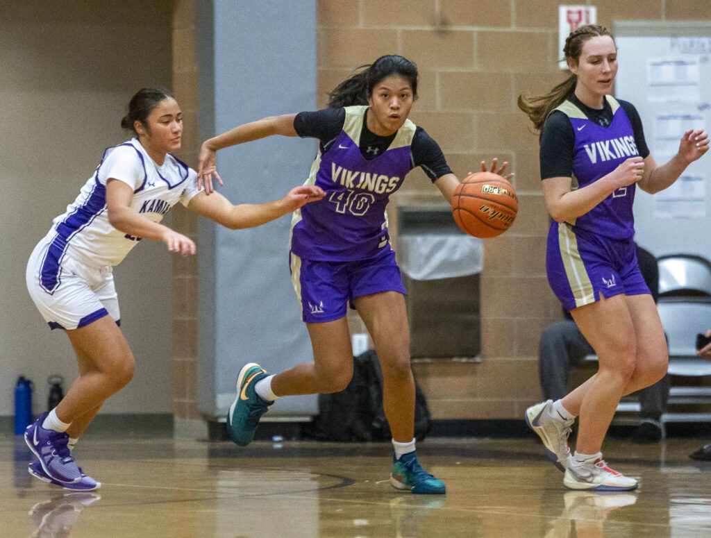 Lake Stevens’ Noelani Tupua steals the ball during the game against Kamiak on Wednesday in Mukilteo. (Olivia Vanni / The Herald)
