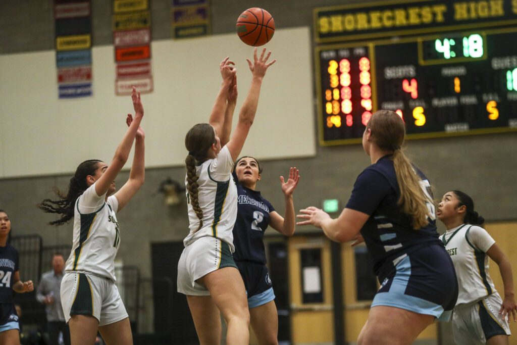 Meadowdale’s Gia Powell (2) contests a shot during a game against Shorecrest on Jan. 5 at Shorecrest High School in Shoreline. (Annie Barker / The Herald)
