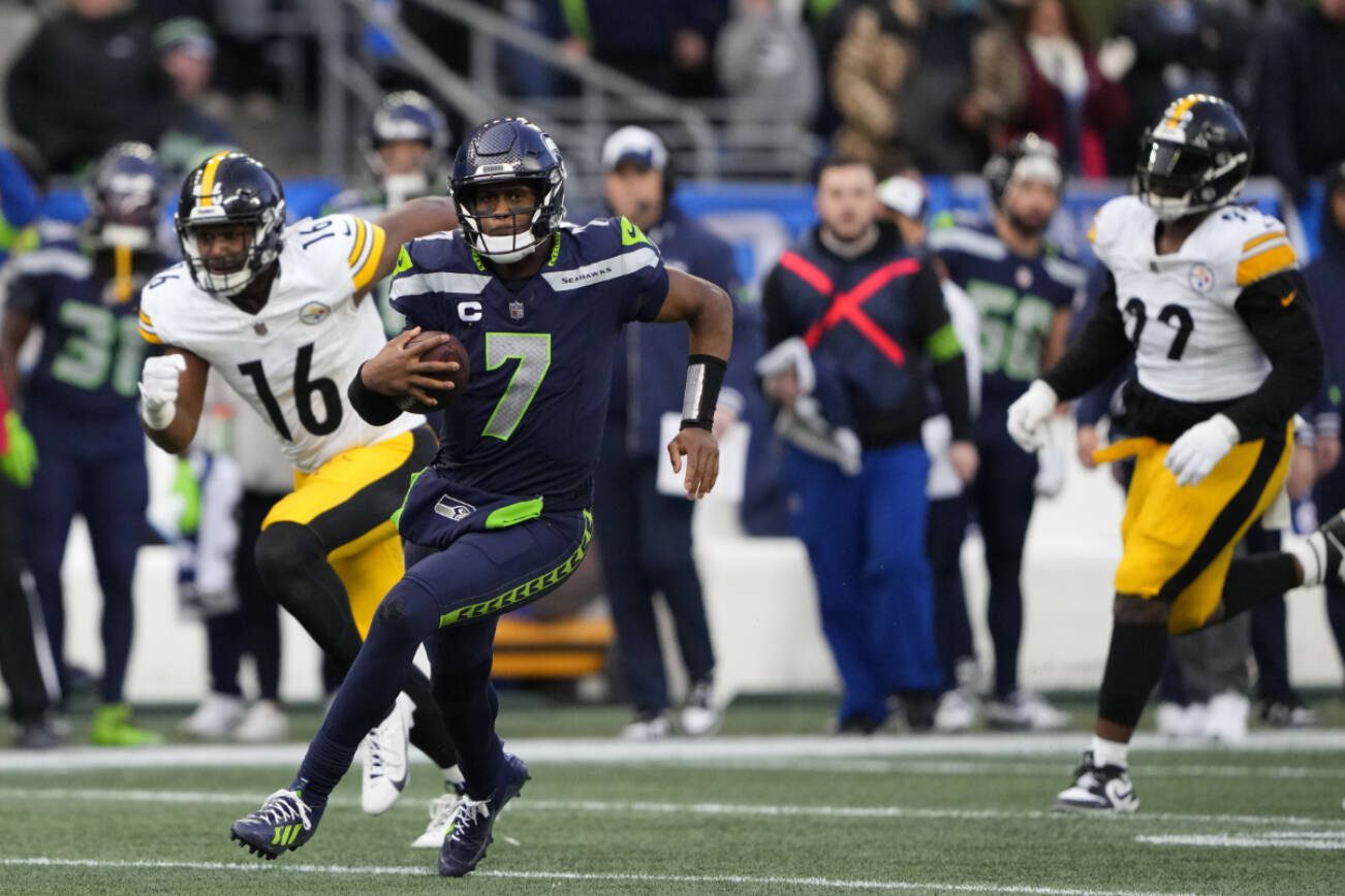 Seattle Seahawks quarterback Geno Smith (7) runs the ball against the Pittsburgh Steelers during the second half of an NFL football game Sunday, Dec. 31, 2023, in Seattle. The Steelers won 30-23. (AP Photo/Lindsey Wasson)