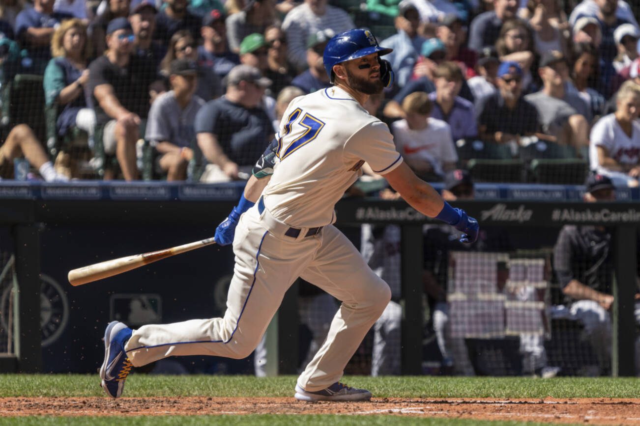 Seattle Mariners' Mitch Haniger takes a swing during an at-bat in a baseball game against the Cleveland Guardians, Sunday, Aug. 28, 2022, in Seattle. The Mariners won 4-0. (AP Photo/Stephen Brashear)