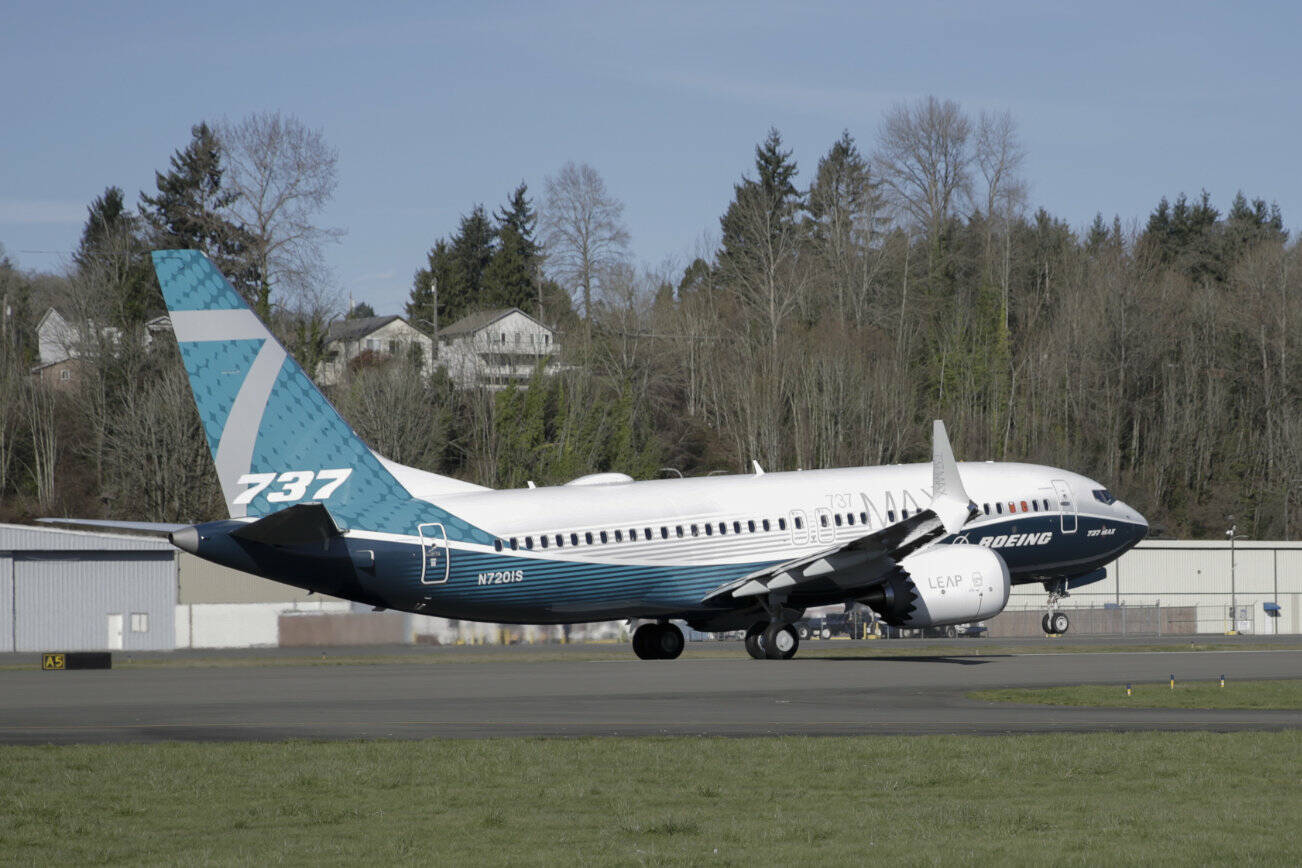 FILE - A Boeing 737 MAX 7 takes off on its first flight, Friday, March 16, 2018, in Renton, Wash. Boeing is asking federal regulators to exempt a new model of its 737 Max airliner from a safety standard designed to prevent part of the engine housing from overheating and breaking off during flight. Boeing needs the exemption to begin delivering the new, smaller Max 7 to airlines.(AP Photo/Jason Redmond, File)