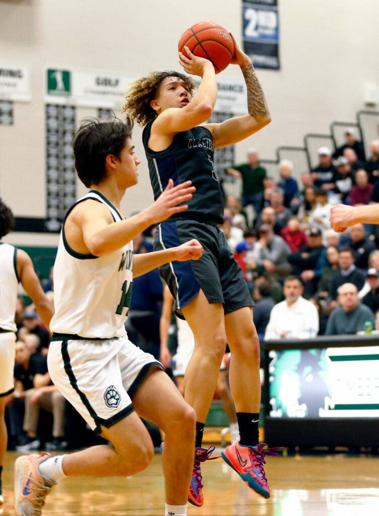 Glacier Peak senior Isaiah Cuellar hits a pop-up jump shot against Jackson on Wednesday, Jan. 10, 2024, at Henry M. Jackson High School in Mill Creek, Washington. (Ryan Berry / The Herald)
