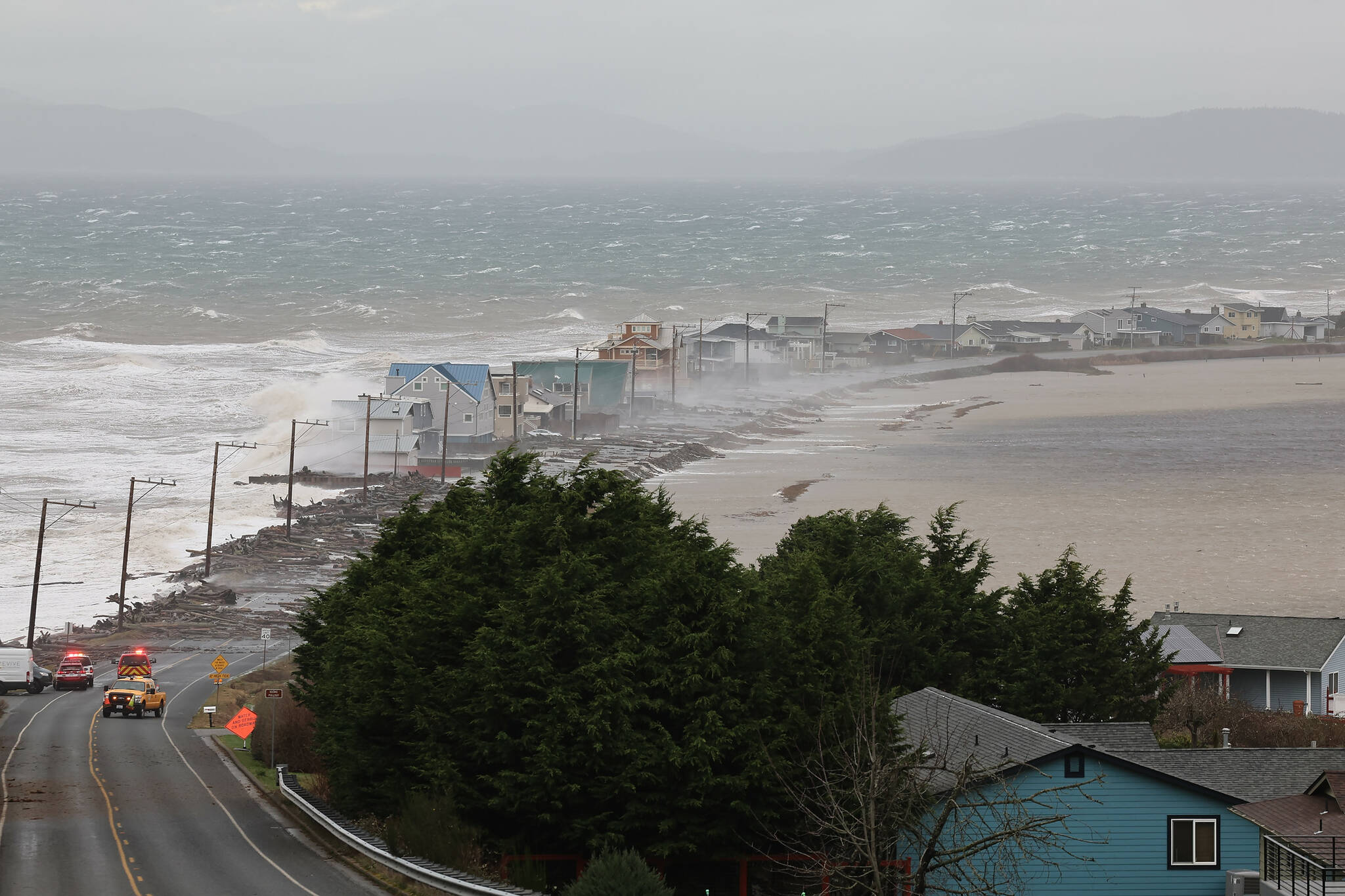 West Beach Road was closed and residents were evacuated during the wind storm Tuesday. (John Fisken / Whidbey News Times)
