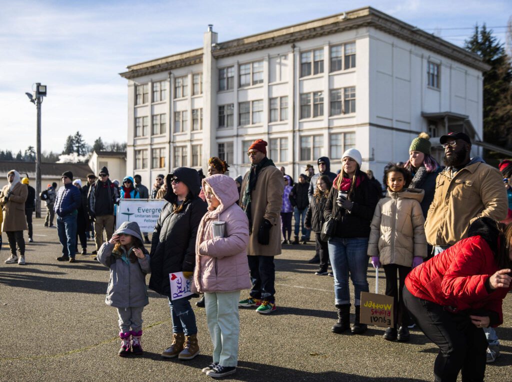 People gather before the start of Snohomish County Black Heritage Committee’s annual Martin Luther King Jr. Day march on Monday, Jan. 15, 2024 in Everett, Washington. (Olivia Vanni / The Herald)
