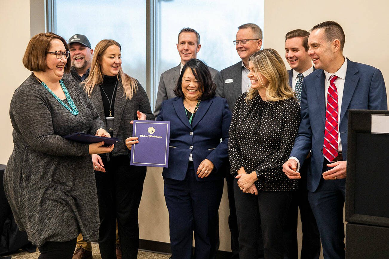 Washington State Department of Commerce Deputy Managing Director Valerie Smith hands out the Governor’s Smart Communities Award on Tuesday, Jan. 16, 2024 in Marysville, Washington. (Olivia Vanni / The Herald)