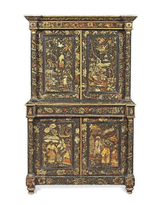 Repainting old furniture is nothing new. This cabinet was made around 1830, but the elaborate decorations were added later.