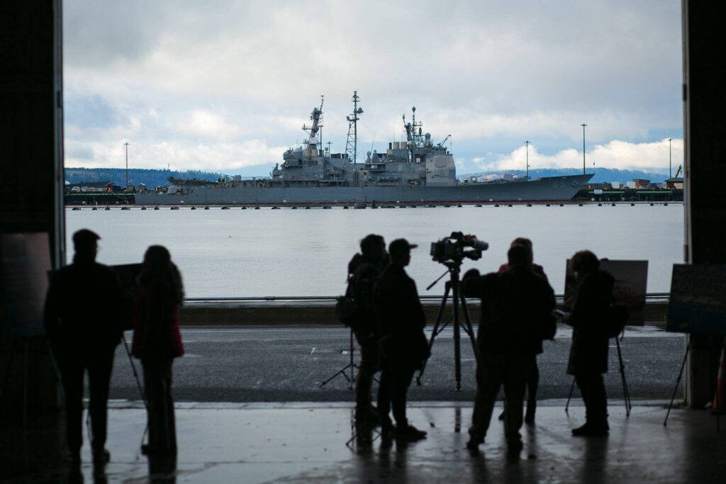 Naval Station Everett is seen across the water from a press conference at the Port of Everett Seaport on Wednesday, Jan. 17, 2024, in Everett, Washington. (Ryan Berry / The Herald)
