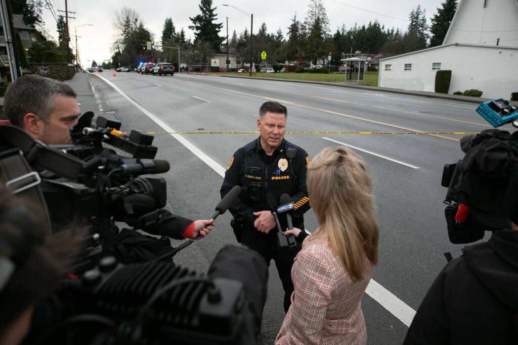 Capt. Robert Goetz of the Everett Police Department speaks with the media during a police standoff related to a shooting at The Bluffs Apartments on West Casino Road on Monday, Jan. 22, 2024, in Everett, Washington. (Ryan Berry / The Herald)
