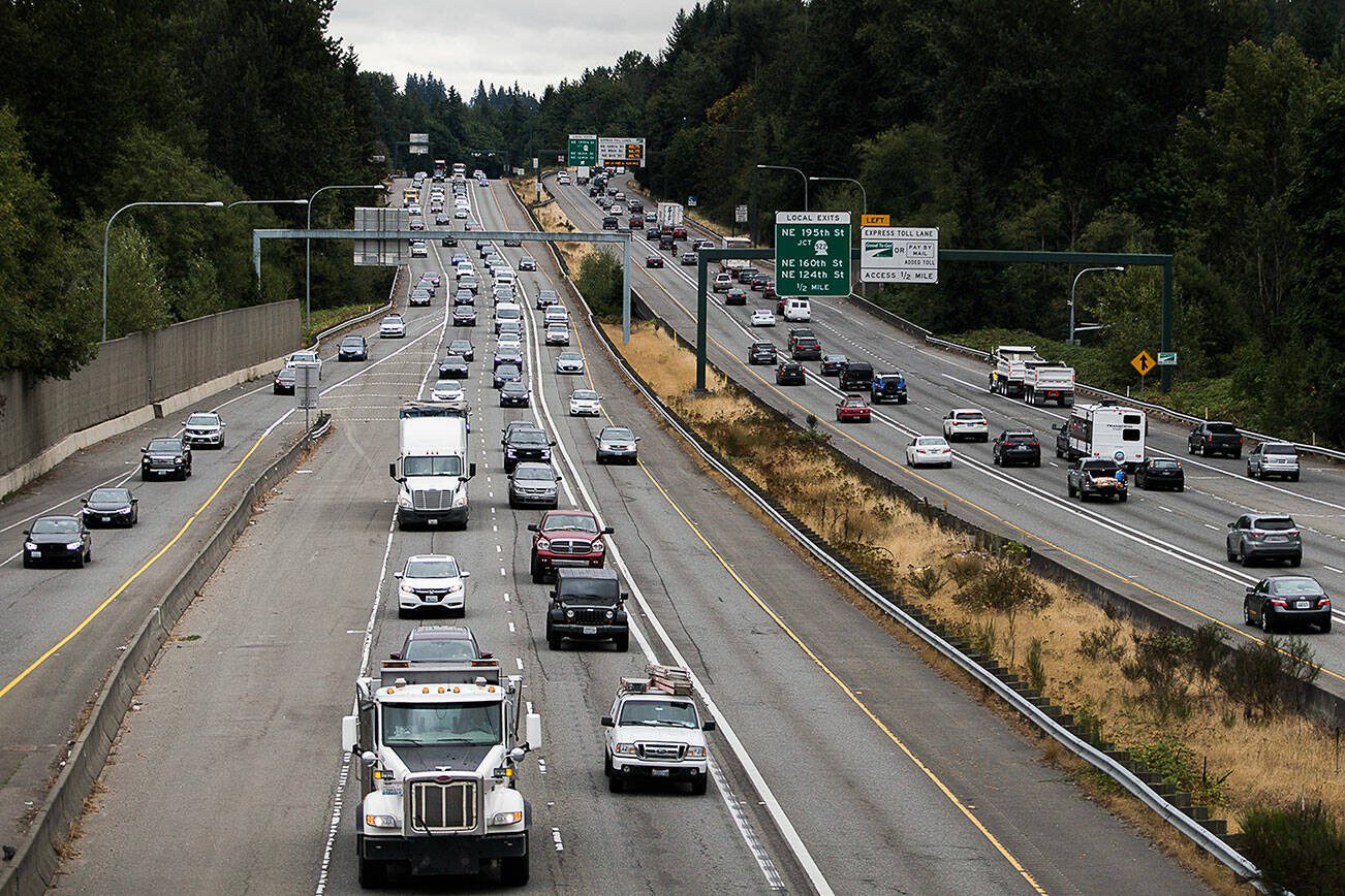 Traffic moves along I-405 between Highway 522 and Highway 527 where WSDOT received the approval to build a second express toll lane on Friday, Aug. 20, 2021 in Bothell, Wash. (Olivia Vanni / The Herald)