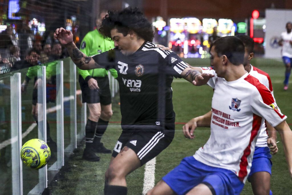 Snohomish County FC Steelheads’ Andres Mansilla (30) attempts to control the ball during a game against the Oly-Pen Force on Jan. 19 at Arena Sports in Mill Creek. (Annie Barker / The Herald)
