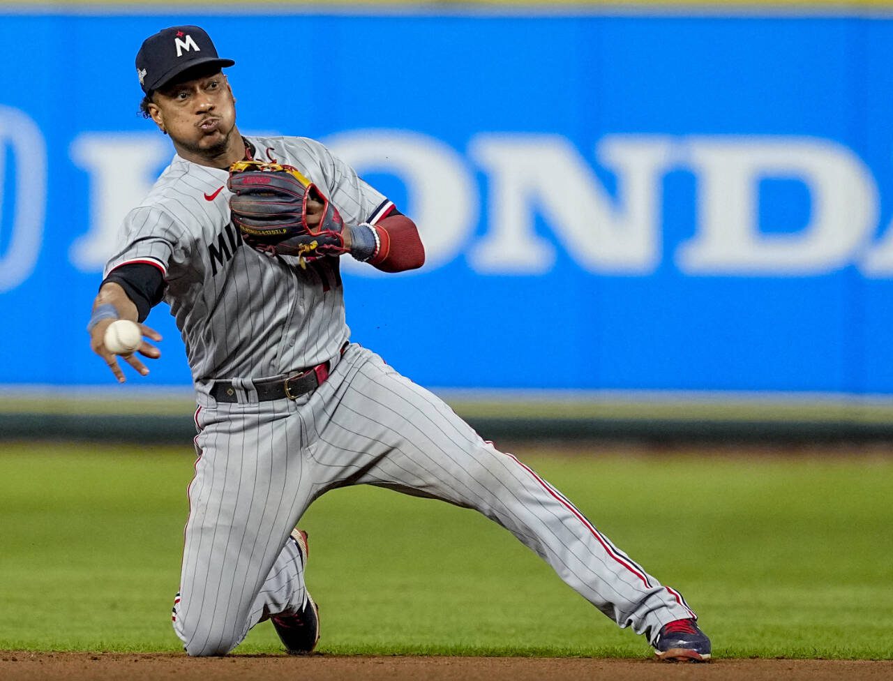 Second baseman Jorge Polanco throws out Houston Astros’ Jeremy Pena at first base while player for the Minnesota Twins during a playoff game in Houston on Oct. 8, 2023. The Seattle Mariners acquired Polanco from the Twins on Monday. (AP Photo/Tony Gutierrez, File)