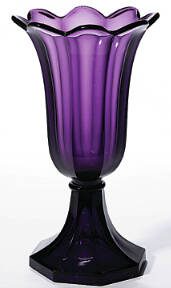 Talk about jewel tones! Amethyst glass was made to resemble the famous purple stone. The simple design of this pressed glass vase puts the focus on its color.